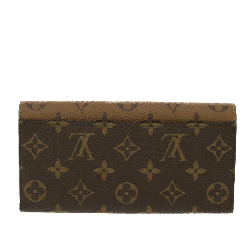 Louis Vuitton Speedy bags in monogram canvas for a classic lookLOUIS VUITTON Monogram Reverse Portefeuille Emily Long Wallet M82157 Auth 40459A